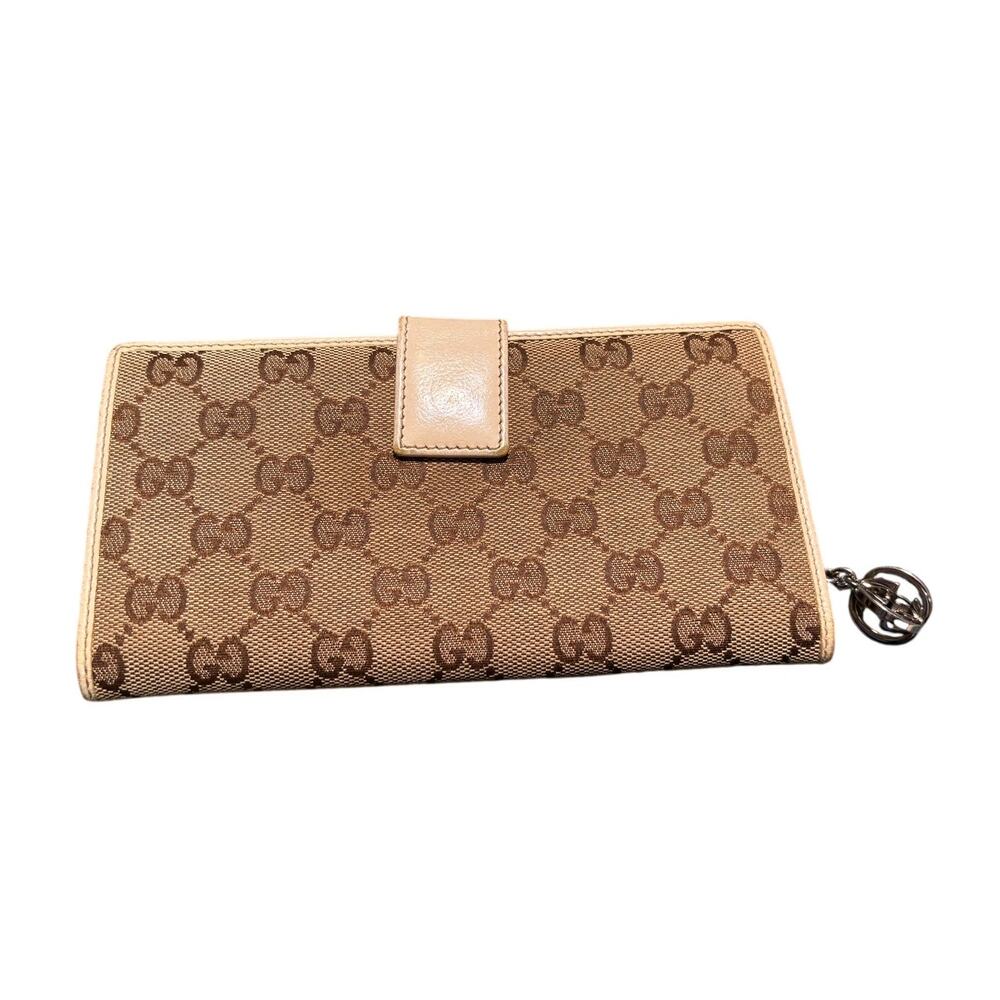 Gucci GG Canvas and Leather long wallet with interlocking GG charm pull